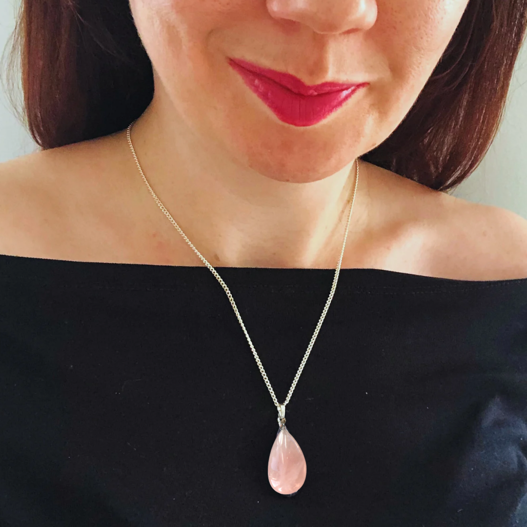 Tiny rose quartz worry stone pendant