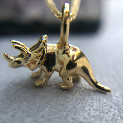 Mini gold triceratops dinosaur pendant