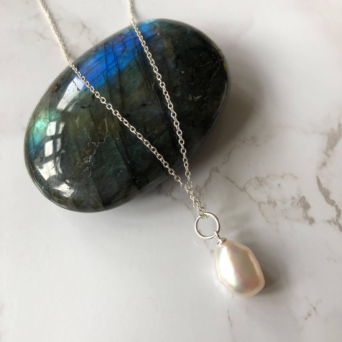 modern white pearl pendant set in 925 sterling silver